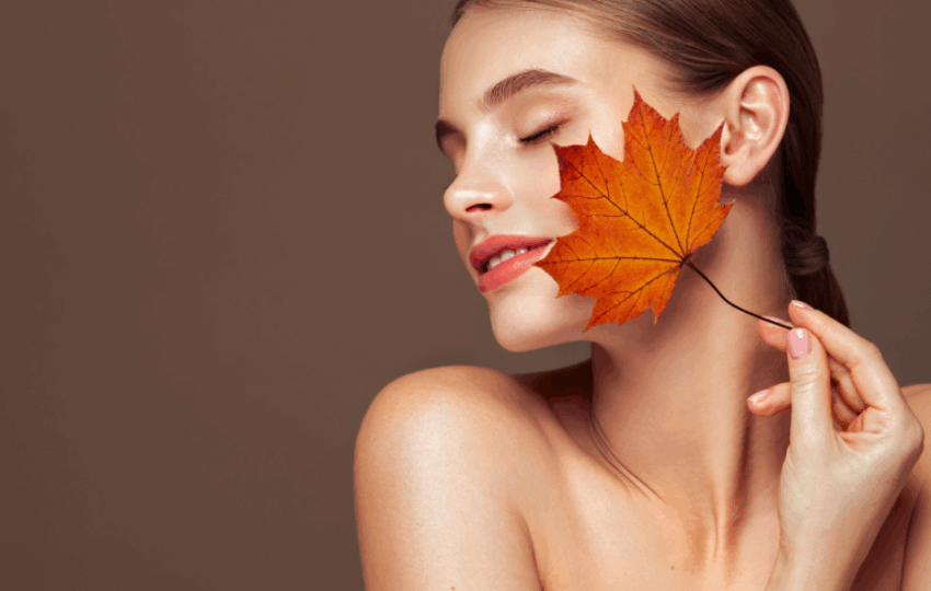 Ultherapy és Infini RF mikrotűs bőrfeszesítő kezelés után ragyogó, feszes arcbőrű nő egy őszi fényben